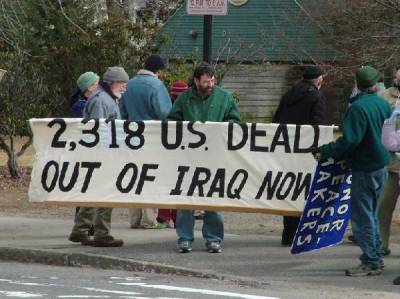 Ken Hannaford-Ricardi demonstrates against the Iraq War in Worcester, 2006