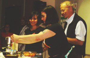 Cooking with Terry Hope Romero, Isa Chandra Moskowitz, and Peter Singer. Photo by Mike Benedetti.